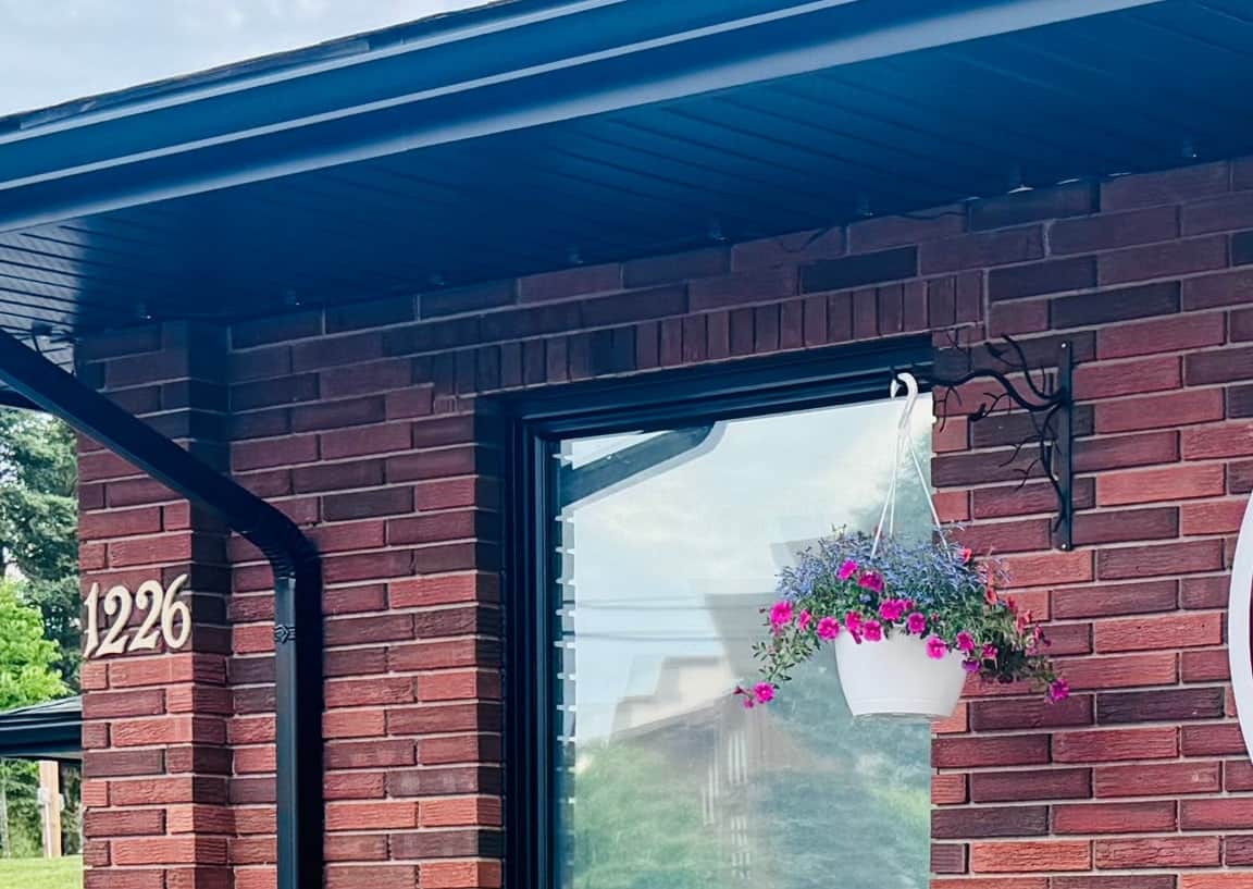 Original brick and roofline at The Cottage on Dawson